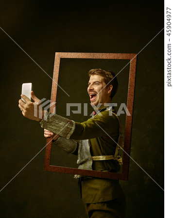 Medieval knight on dark background. 45904977