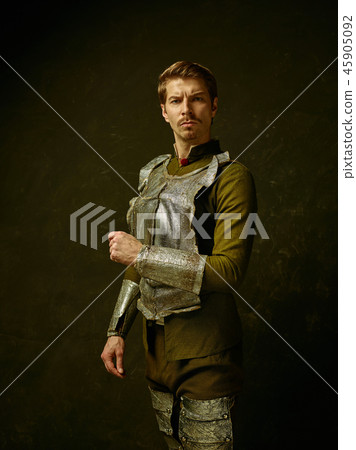 Medieval knight on dark background. 45905092