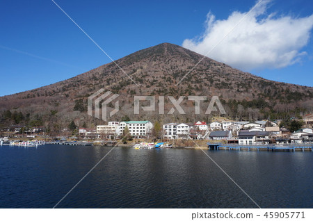 [100 Famous Mountains of Japan] [Nikko National Park] Blue sky in late autumn, Mt. Nantai and the cityscape of Chugushi, Nikko City, Tochigi Prefecture 45905771