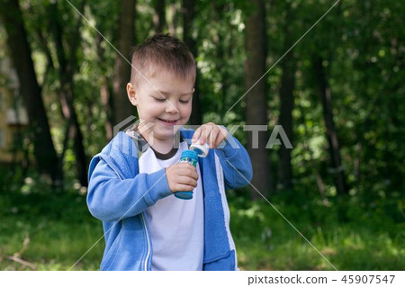 4 years Little boy with soap bubbles 45907547