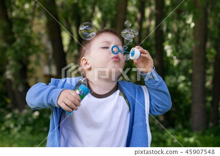 4 years Little boy with soap bubbles 45907548