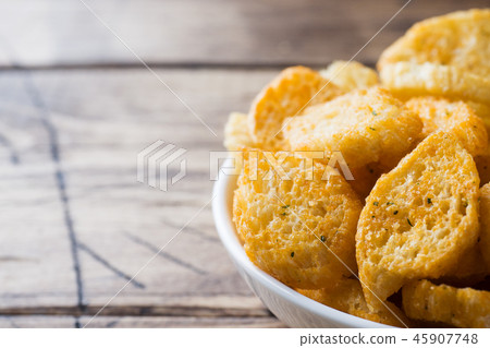Croutons of white bread baguette with spices  45907748