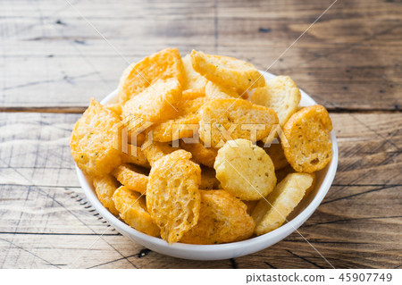 Croutons of white bread baguette with spices  45907749