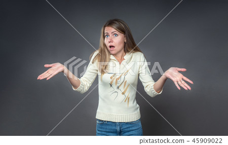 Woman with shocked facial expression. The brunette 45909022