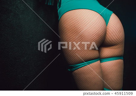 Beautiful young woman in sexy lingerie dancing in nightclub. 45911509