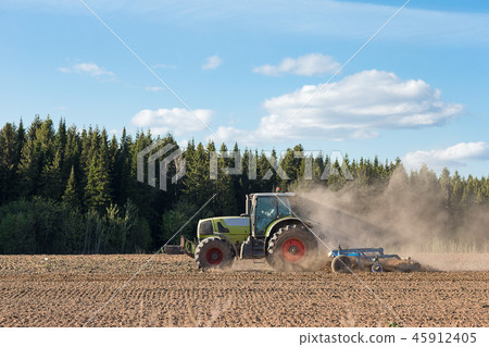 Farmer preparing farmland Farmer preparing farmland 45912405