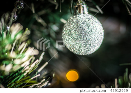 Christmas bulbs on christmas tree 45912939