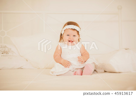 little fairy sitting on the bed 45913617
