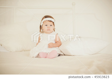 Portrait of a cute little girl Portrait of a cute little girl 45913623