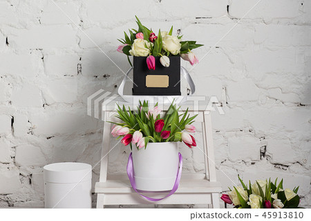 Bouquet of roses and tulips in a gift box Bouquet of roses and tulips in a gift box 45913810