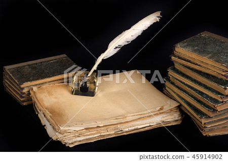 background with old ink bottle, books, and quill 45914902