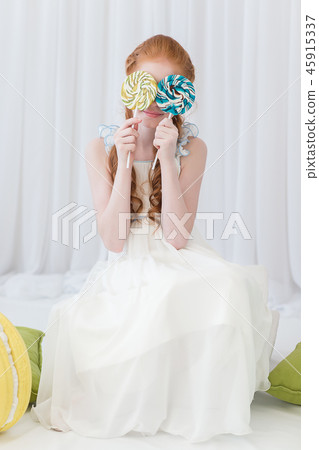 Funny child with candy lollipop Funny child with candy lollipop 45915337