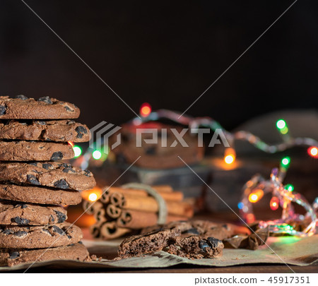round chocolate cookies in a stack 45917351