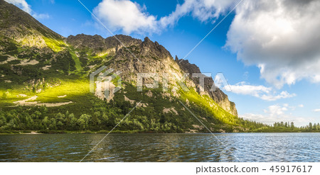 Mountain Lake with Rocks in Foreground 45917617