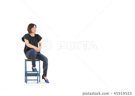Women sitting on a stepladder 45919583
