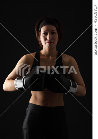 Female fighter doing boxer size Female fighter doing boxer size 45919717