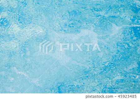Ripple water in swimming pool sun reflection. 45923485
