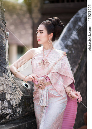 Beautiful Thai girl in Thai traditional costume Beautiful Thai girl in Thai traditional costume 45925993