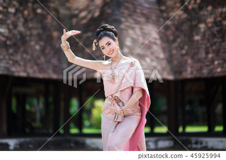 Beautiful Thai girl in Thai traditional costume. Beautiful Thai girl in Thai traditional costume. 45925994