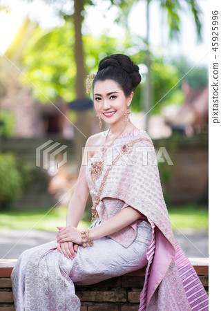 Beautiful Thai girl in Thai traditional costume Beautiful Thai girl in Thai traditional costume 45925996