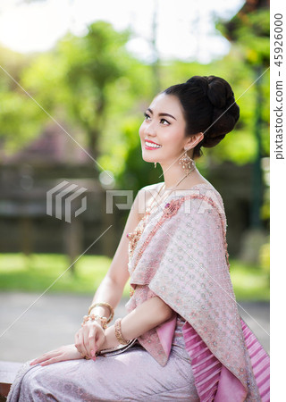 Beautiful Thai girl in Thai traditional costume Beautiful Thai girl in Thai traditional costume 45926000