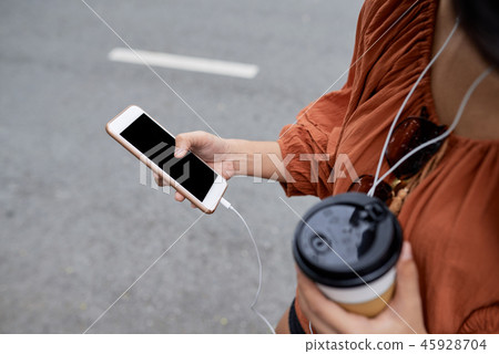 Girl checking mobile app Girl checking mobile app 45928704