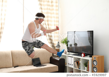 Young handsome man in shorts and 45929997