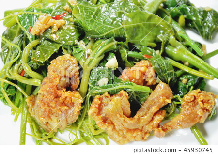 fried Chayote sprout with crispy chicken on plate 45930745