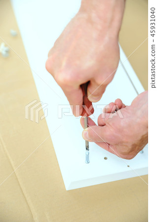 Furniture assembly at home. 45931040