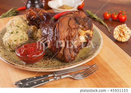 pork knuckle with side dish and gravy pork knuckle with side dish and gravy 45931133