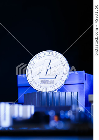 Picture of litecoin and processor on blue background 45931350