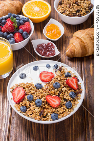 Granola yogurt and berries 45931888