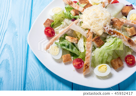 Salad ceasar with chicken , eggs and tomatoes Salad ceasar with chicken , eggs and tomatoes 45932417