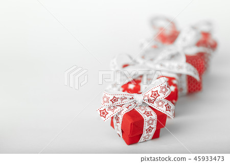 Red Christmas gift boxes on white background 45933473