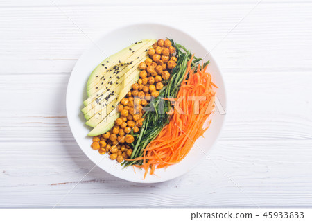 Buddha bowl with avocado cucumber carrot chickpea Buddha bowl with avocado cucumber carrot chickpea 45933833