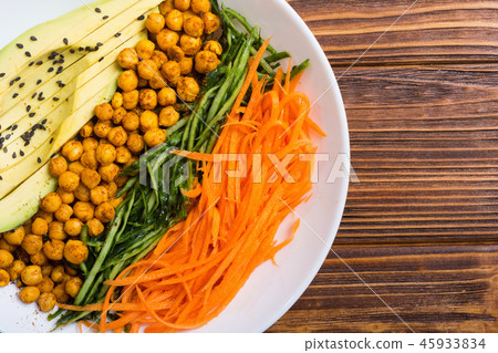 Buddha bowl with avocado cucumber carrot chickpea Buddha bowl with avocado cucumber carrot chickpea 45933834
