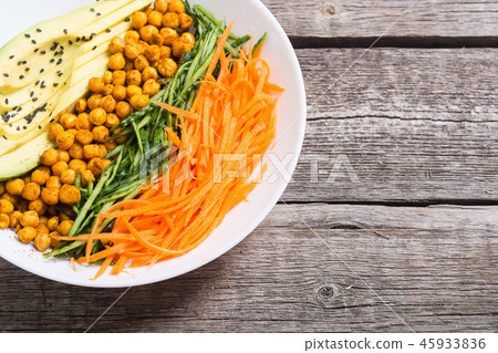 Buddha bowl with avocado cucumber carrot chickpea Buddha bowl with avocado cucumber carrot chickpea 45933836