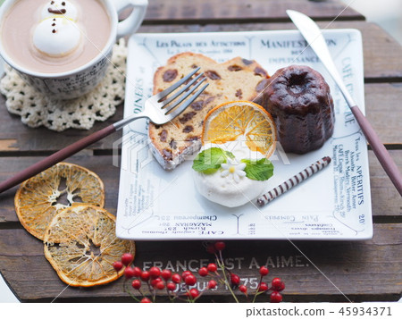 Tea time with one plate of fashionable sweets Tea time with one plate of fashionable sweets 45934371