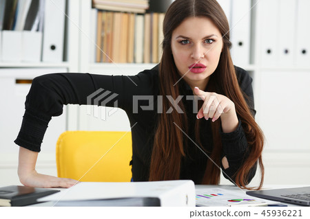 Beautiful smiling clerk girl at workplace talk to visitor Beautiful smiling clerk girl at workplace talk to visitor 45936221