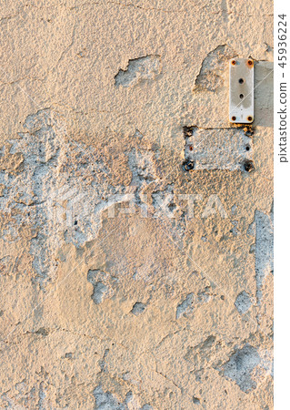 Paint peeling of from wall 45936224