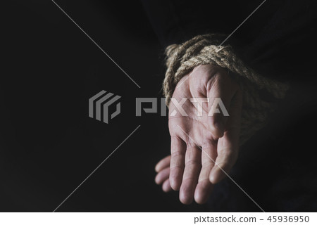 man with his hands tied behind his back man with his hands tied behind his back 45936950
