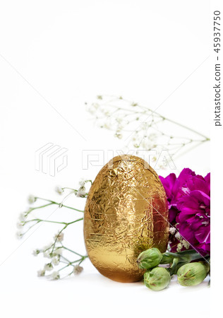 Golden egg and fuchsia flowers on white background Golden egg and fuchsia flowers on white background 45937750