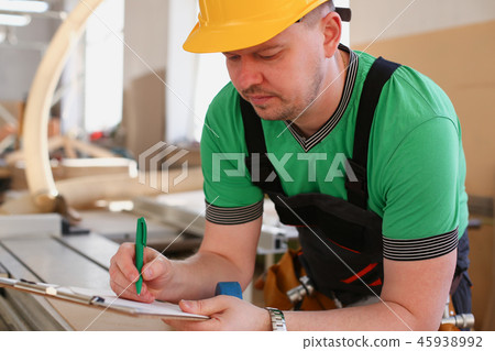 Portrait of young attractive man in work Portrait of young attractive man in work 45938992