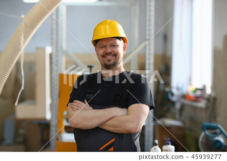 Portrait of young attractive man in work clothes 45939277