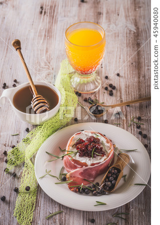 Whole camembert wrapped in dry ham Whole camembert wrapped in dry ham 45940080