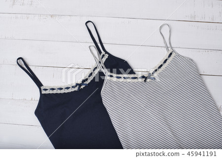 Two vest on wooden background. Fashionable concept 45941191