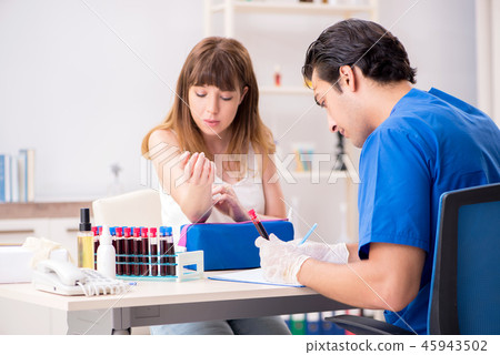 Young patient during blood test sampling procedure   45943502