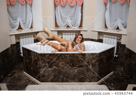 Playful beautiful woman in the bathroom Playful beautiful woman in the bathroom 45943744