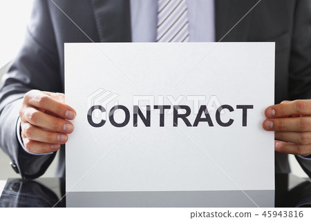 Man in suit and tie hold in arms contract 45943816