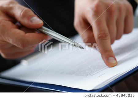 Male arm in suit offer contract form on Male arm in suit offer contract form on 45943835